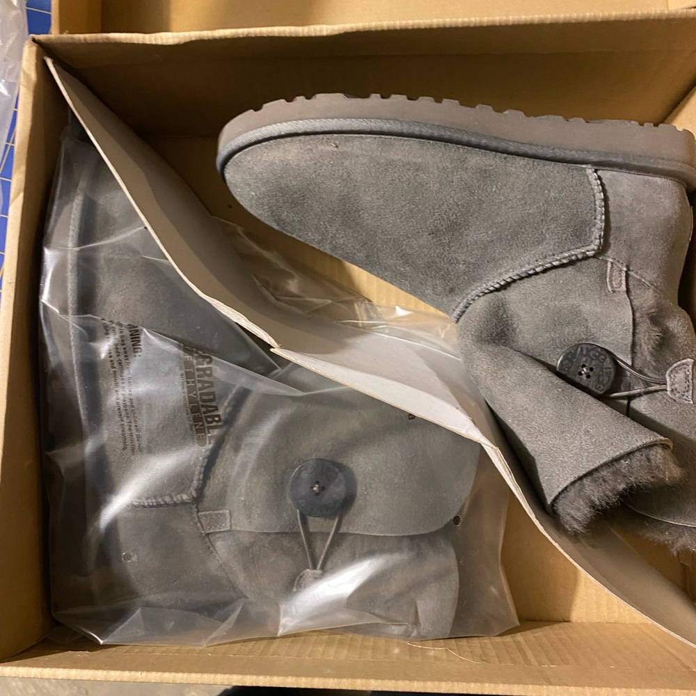 Uggs. Brand new. Never worn and in box.